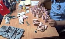 Topladığı paraları koltuk değneğine zulaladı